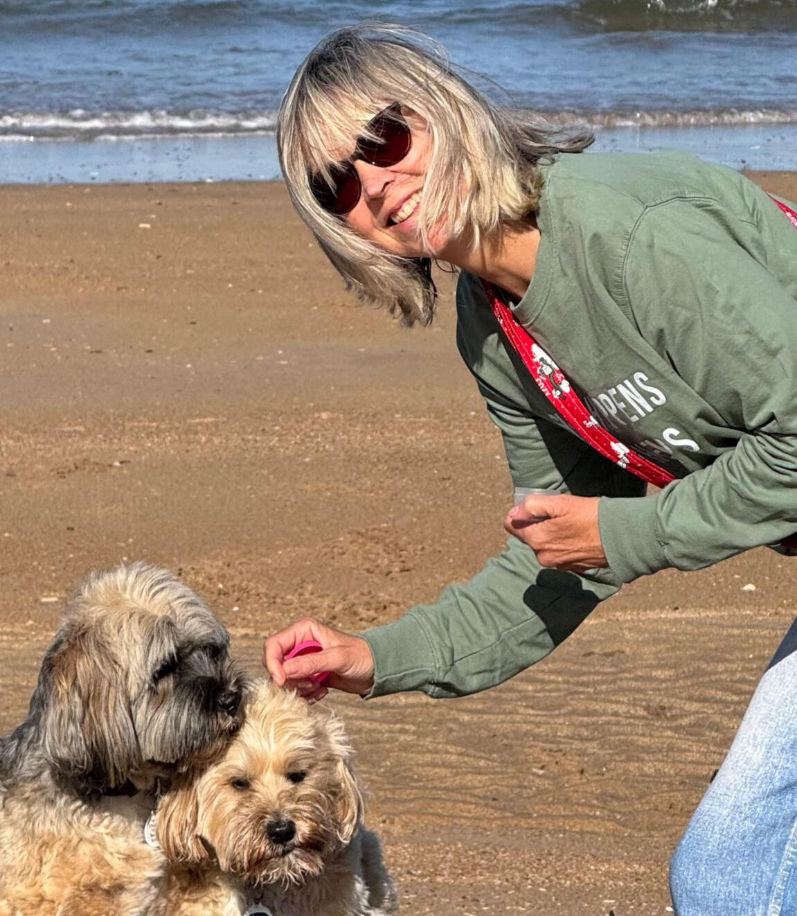 Maureen Byrne Maureen Byrne walking on the beach with her dogs